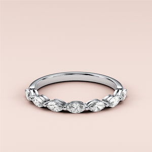 Elegant 14K/18K/Platinum marquise half eternity wedding band with diamond accents, showcasing intricate design details. 
