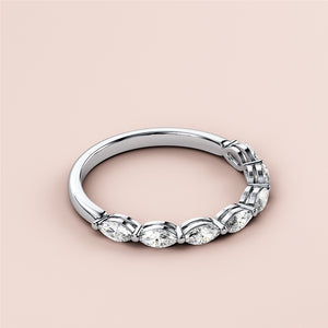 Elegant white gold marquise half eternity wedding band featuring shared prong setting and multiple diamonds, perfect for lasting love. 