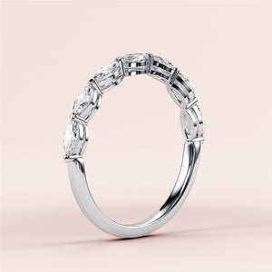 Elegant marquise half eternity wedding band featuring diamonds in a 14K or 18K white gold band, perfect for timeless elegance. 