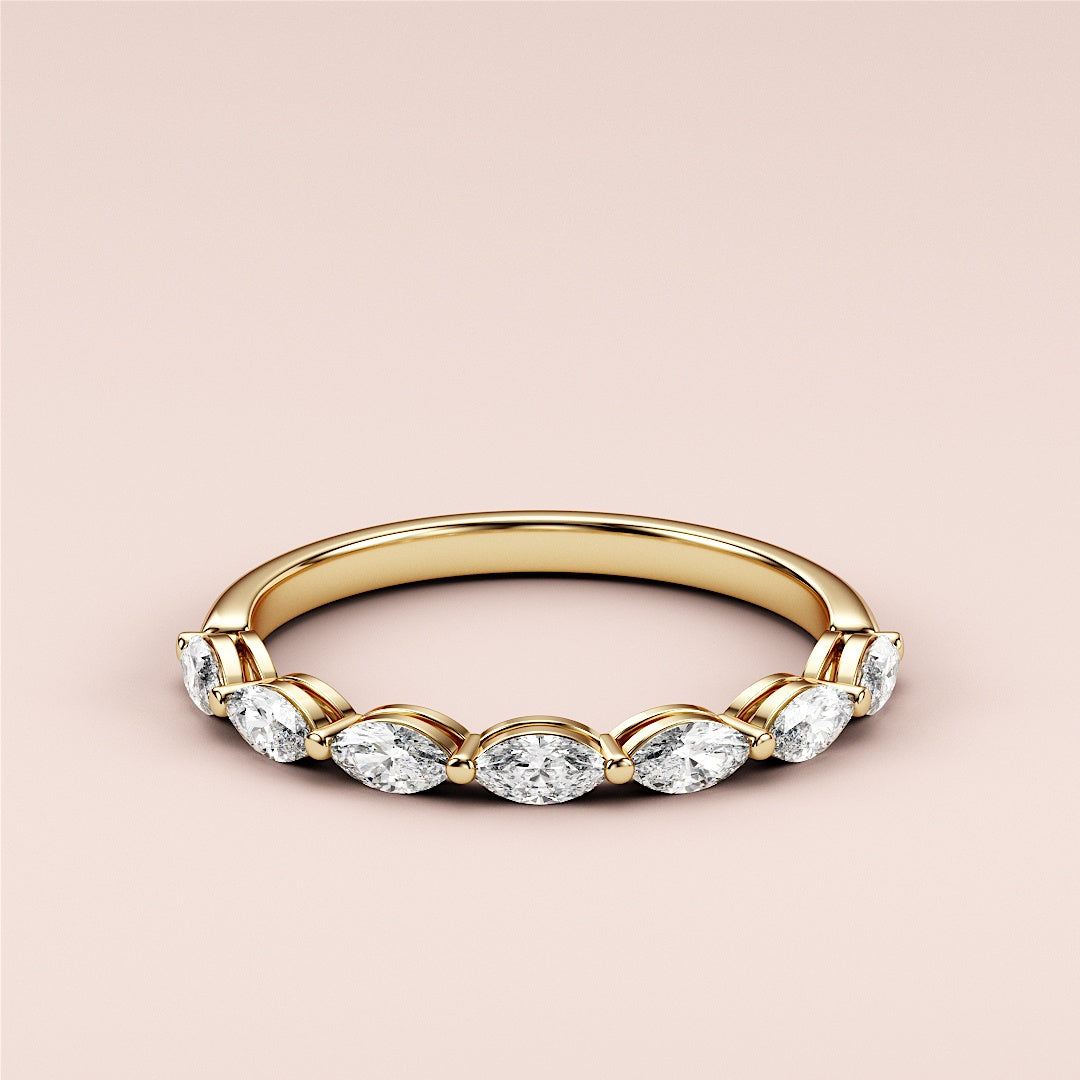 14K/18K yellow gold half eternity wedding band featuring marquise-cut diamonds, close-up view for elegance and shine. |
 
 
 #14KRecycledYellowGold
 #18KRecycledYellowGold