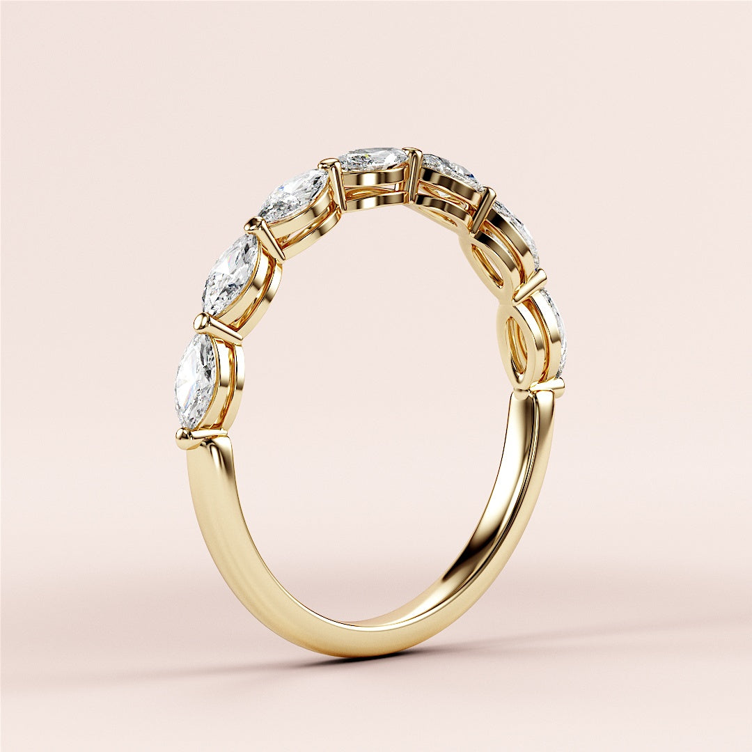 Elegant 14K/18K gold wedding band featuring marquise-cut diamonds in a stunning eternity design, perfect for special occasions. |
 
 
 #14KRecycledYellowGold
 #18KRecycledYellowGold