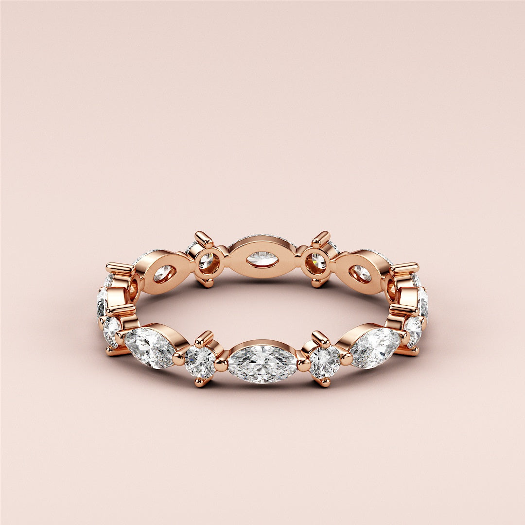 Elegant rose gold eternity band featuring marquise and round-cut diamonds, available in 14K, 18K, or platinum.  Not worn on model. |
 
 
 
 
 #14KRecycledRoseGold
 #18KRecycledRoseGold