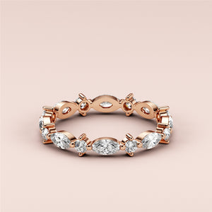Elegant rose gold eternity band featuring marquise and round-cut diamonds, available in 14K, 18K, or platinum.  Not worn on model. 