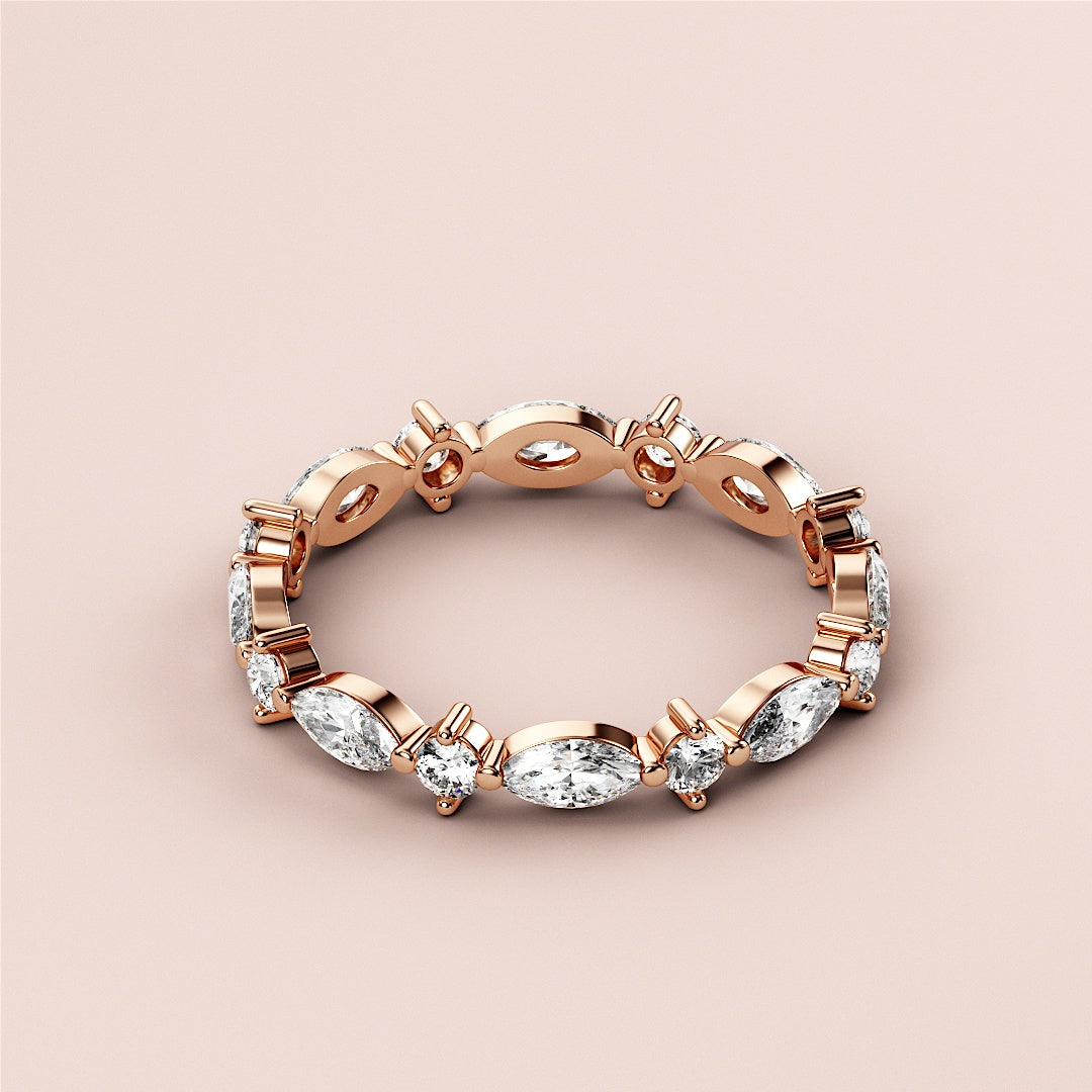 Elegant 14K or 18K rose gold eternity wedding band featuring marquise diamonds and intricate detailing. |
 
 
 
 
 #14KRecycledRoseGold
 #18KRecycledRoseGold