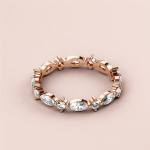 Elegant 14K or 18K rose gold eternity wedding band featuring marquise diamonds and intricate detailing. 