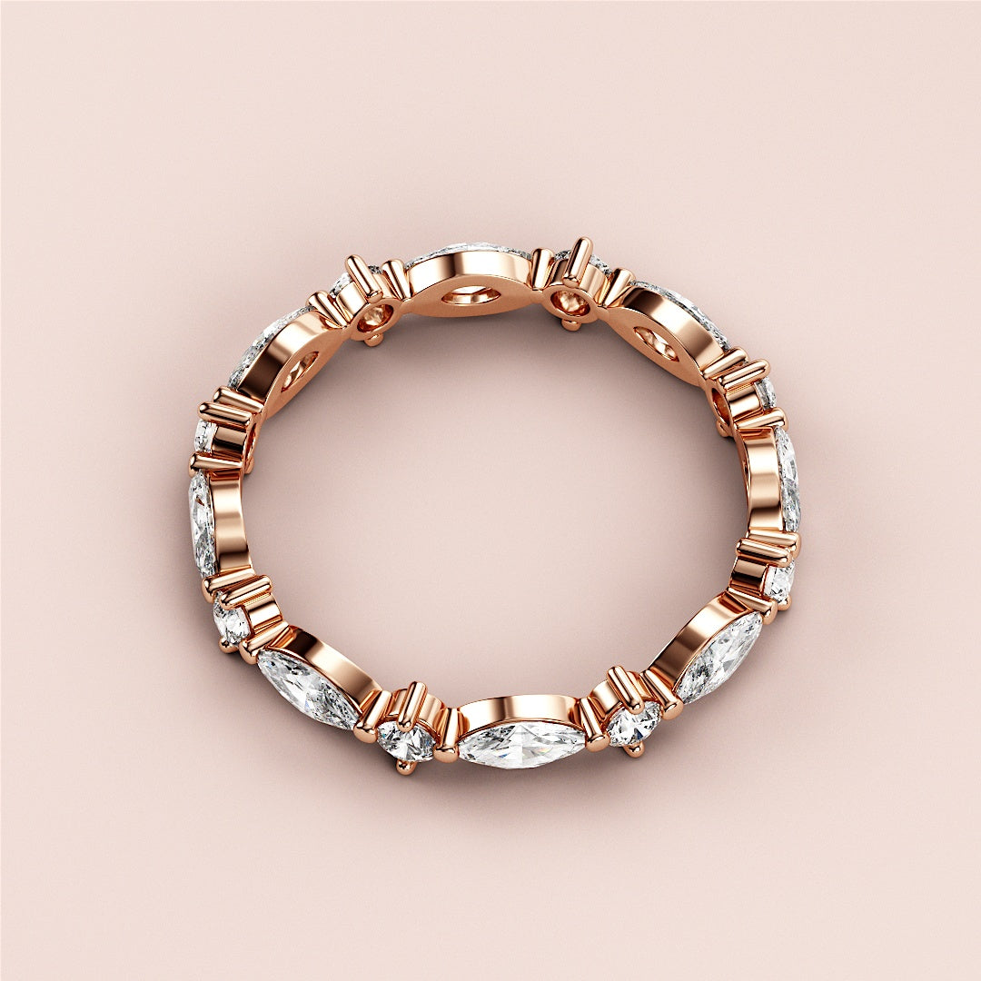 Elegant 14K rose gold wedding band featuring marquise-shaped diamonds, perfect for eternity style collections. |
 
 
 
 
 #14KRecycledRoseGold
 #18KRecycledRoseGold