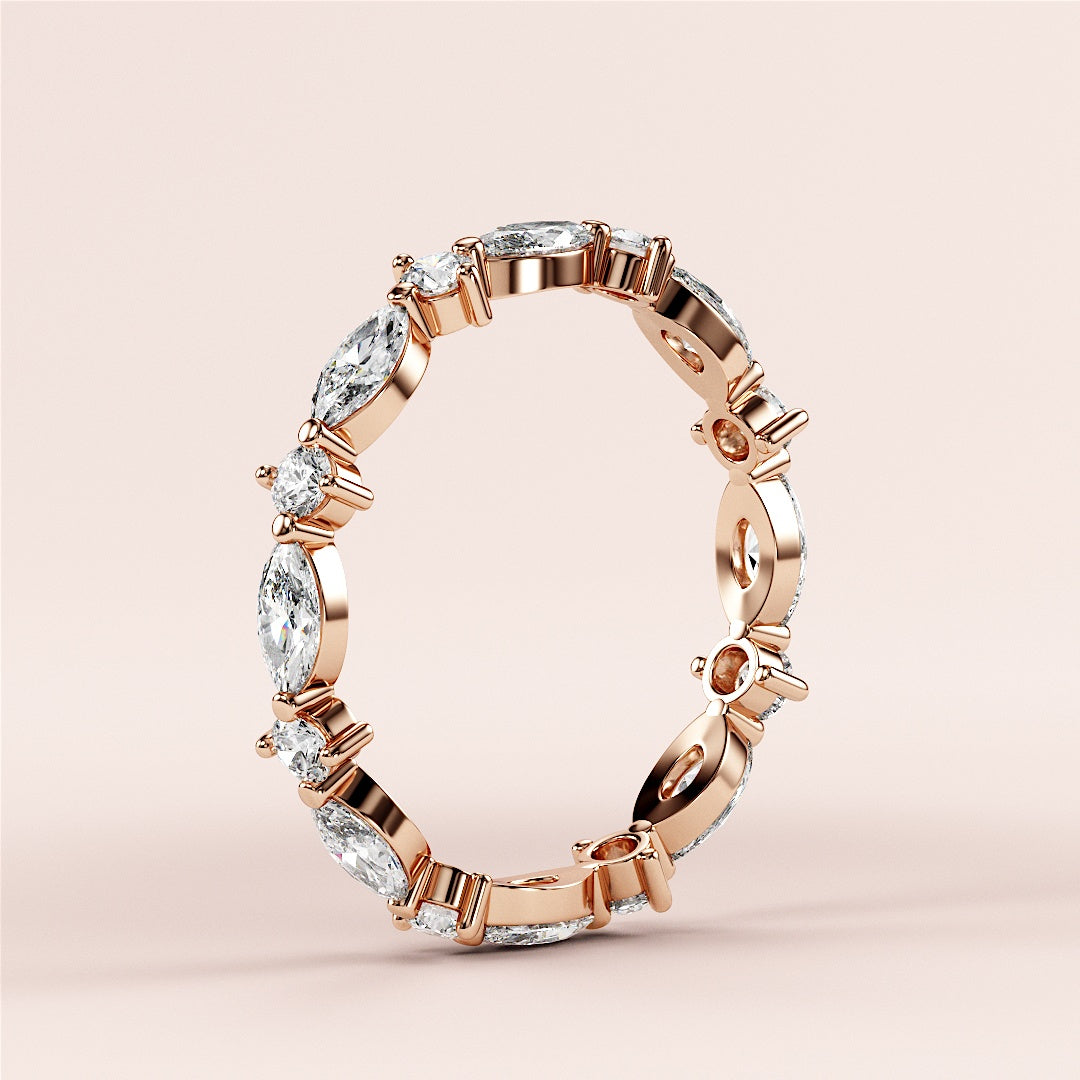 Elegant marquise diamond eternity band in 14K rose gold, featuring alternating marquise and round diamonds. |
 
 
 
 
 #14KRecycledRoseGold
 #18KRecycledRoseGold