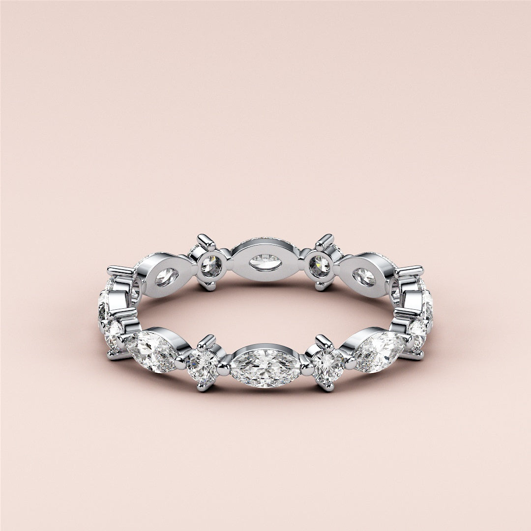 Elegant 14K or 18K white gold eternity band with marquise and round diamonds, ideal for weddings and anniversaries. |
 #14KRecycledWhiteGold
 #18KRecycledWhiteGold
 
 
 
 
 #Platinum