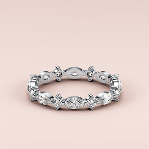 Elegant 14K or 18K white gold eternity band with marquise and round diamonds, ideal for weddings and anniversaries. 