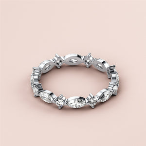 Elegant 14K or 18K white gold wedding band featuring marquise and baguette-cut diamonds, perfect for eternity celebrations. 