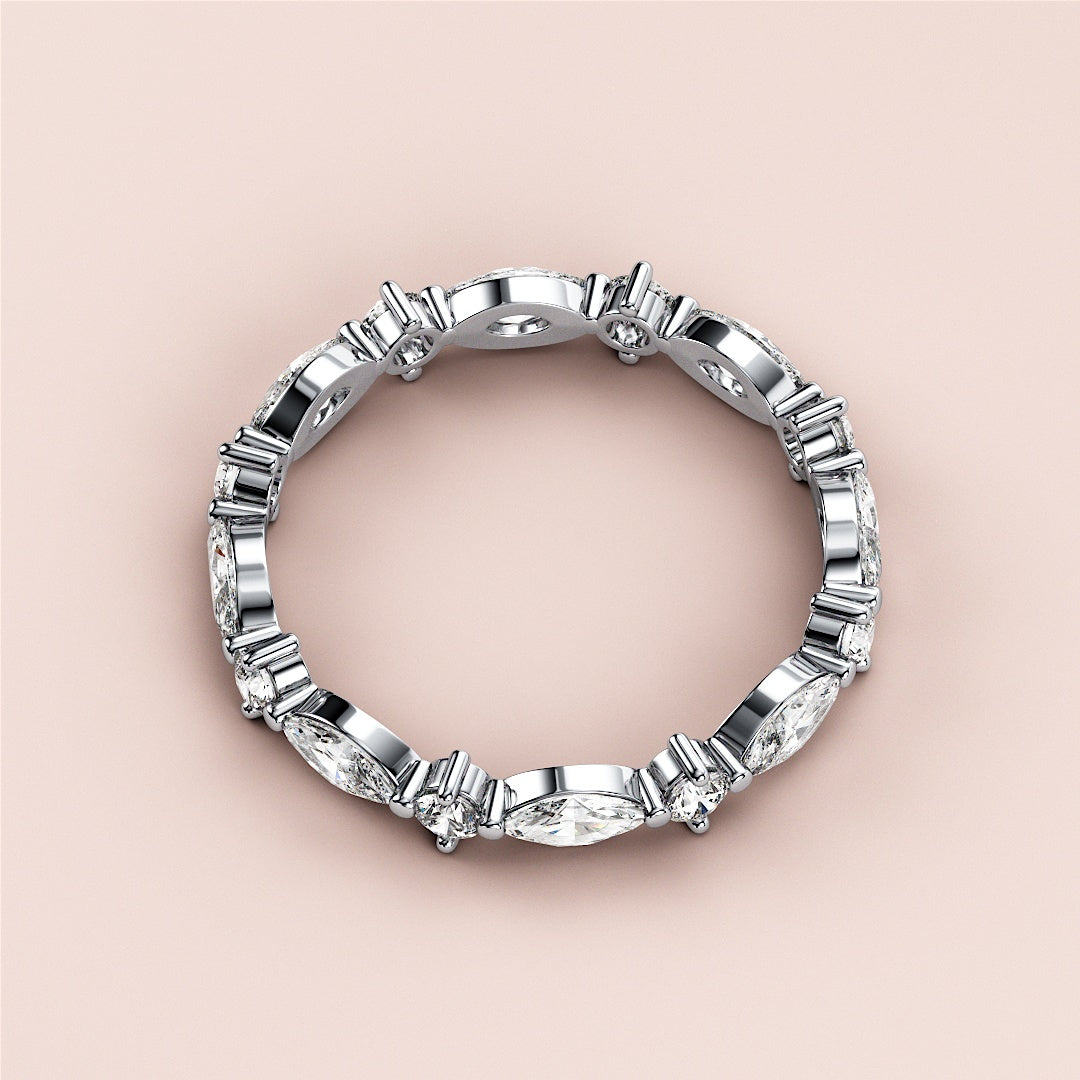 Elegant 14K or 18K white gold eternity wedding band featuring alternating marquise and baguette diamonds for a sophisticated touch. |
 #14KRecycledWhiteGold
 #18KRecycledWhiteGold
 
 
 
 
 #Platinum