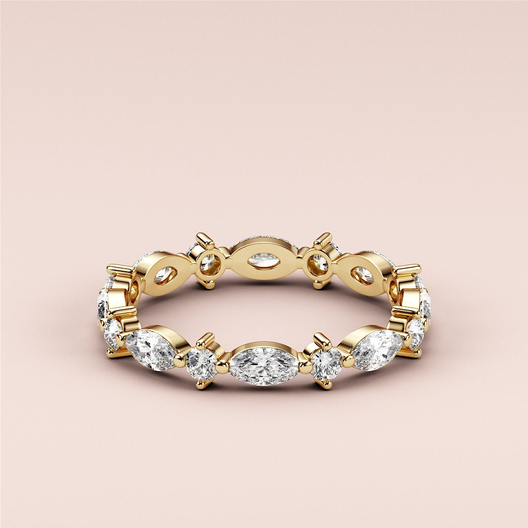 Elegant 14K or 18K yellow gold marquise and round-cut diamond eternity ring, perfect as a wedding band. |
 
 
 #14KRecycledYellowGold
 #18KRecycledYellowGold
