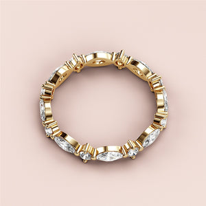 14K yellow gold eternity wedding band featuring marquise-cut diamond accents; close-up product shot. 