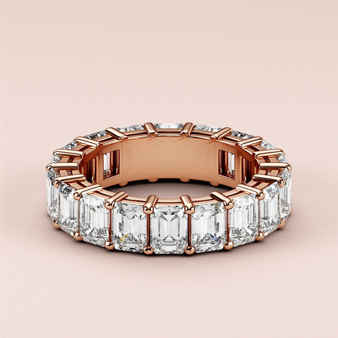 Elegant oval diamond solitaire engagement ring in 14K or 18K rose gold, featuring a hidden halo and plain band.
