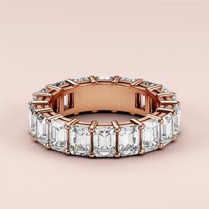 Elegant oval diamond solitaire engagement ring in 14K or 18K rose gold, featuring a hidden halo and plain band.