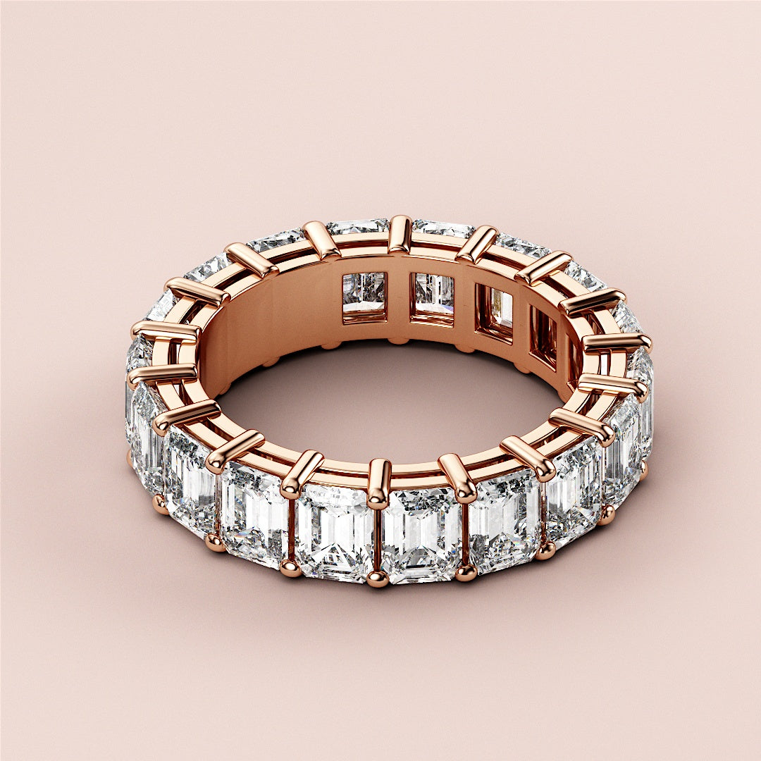 Elegant oval diamond solitaire engagement ring in 14K or 18K rose gold, featuring a hidden halo and plain band.