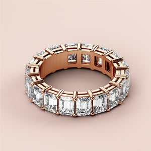 Elegant oval diamond solitaire engagement ring in 14K or 18K rose gold, featuring a hidden halo and plain band.