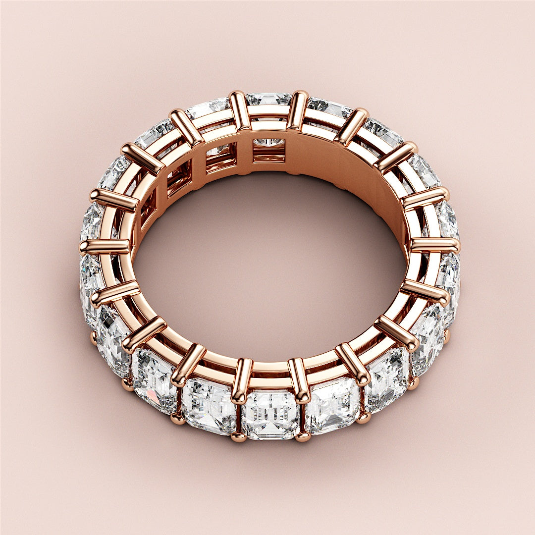 Elegant oval diamond solitaire engagement ring in 14K or 18K rose gold, featuring a hidden halo and plain band.