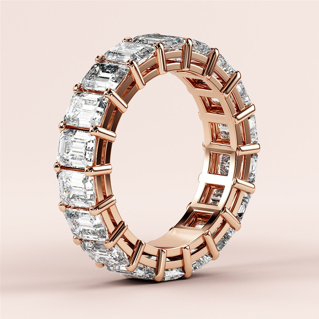 Elegant oval diamond solitaire engagement ring in 14K or 18K rose gold, featuring a hidden halo and plain band.
