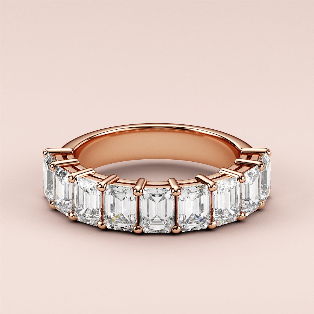 Elegant rose gold wedding band featuring emerald-cut diamonds, available in 14K, 18K, and platinum for timeless elegance. |
 
 
 
 
 #14KRecycledRoseGold
 #18KRecycledRoseGold