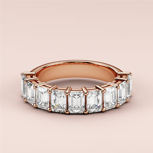 Elegant rose gold wedding band featuring emerald-cut diamonds, available in 14K, 18K, and platinum for timeless elegance. 