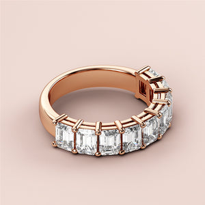 Rose gold half eternity wedding band set with asscher-cut diamonds, available in 14K, 18K, and platinum, unworn in image. 