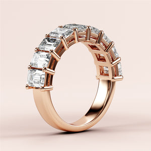 Elegant rose gold wedding band featuring emerald-cut diamonds, set in 14K or 18K gold.  Timeless half eternity design. 