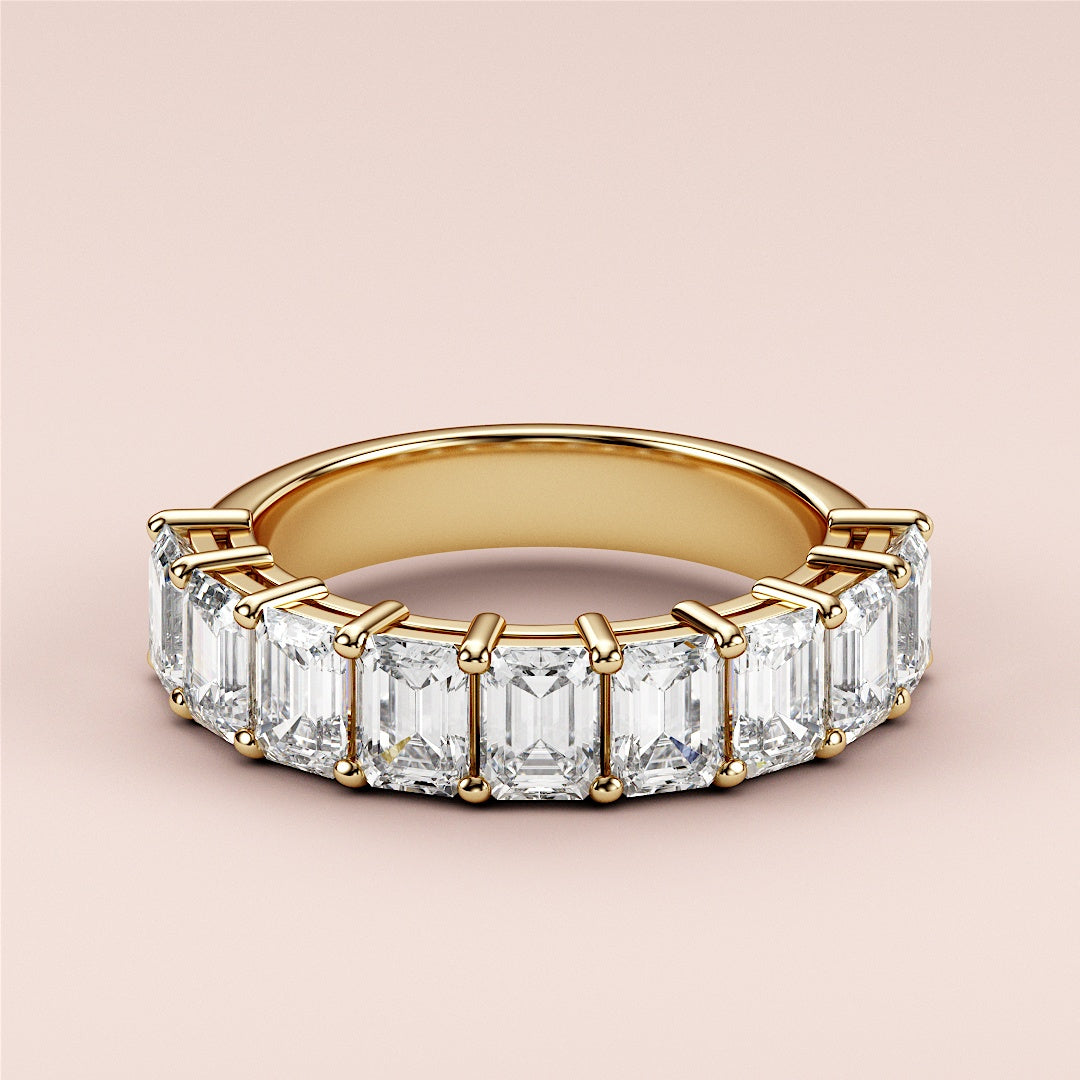 Elegant 14K yellow gold half eternity wedding band featuring radiant cut diamonds, also available in 18K and platinum. |
 
 
 #14KRecycledYellowGold
 #18KRecycledYellowGold