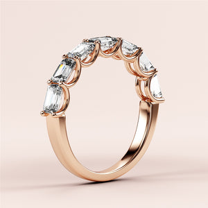 Elegant rose gold eternity band with radiant-cut diamonds, available in 14K, 18K, or platinum settings. Perfect wedding band choice. 