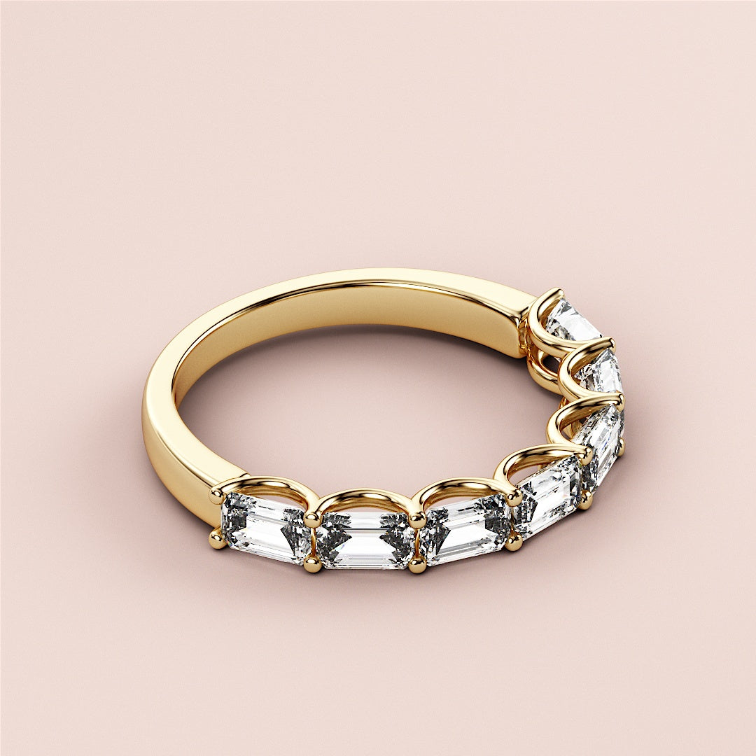 Elegant 14K or 18K yellow gold emerald half eternity wedding band, featuring stunning marquise-cut diamonds for timeless sophistication. |
 
 
 #14KRecycledYellowGold
 #18KRecycledYellowGold
