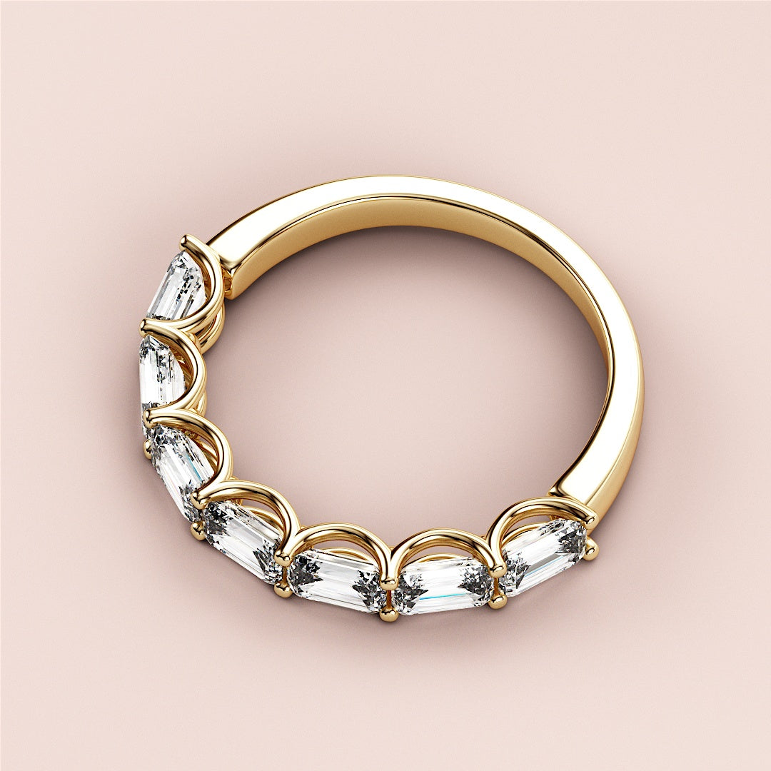 Elegant 14K or 18K Gold Wedding Band featuring Emerald-Cut Diamonds in a half-eternity design, perfect for any occasion. |
 
 
 #14KRecycledYellowGold
 #18KRecycledYellowGold