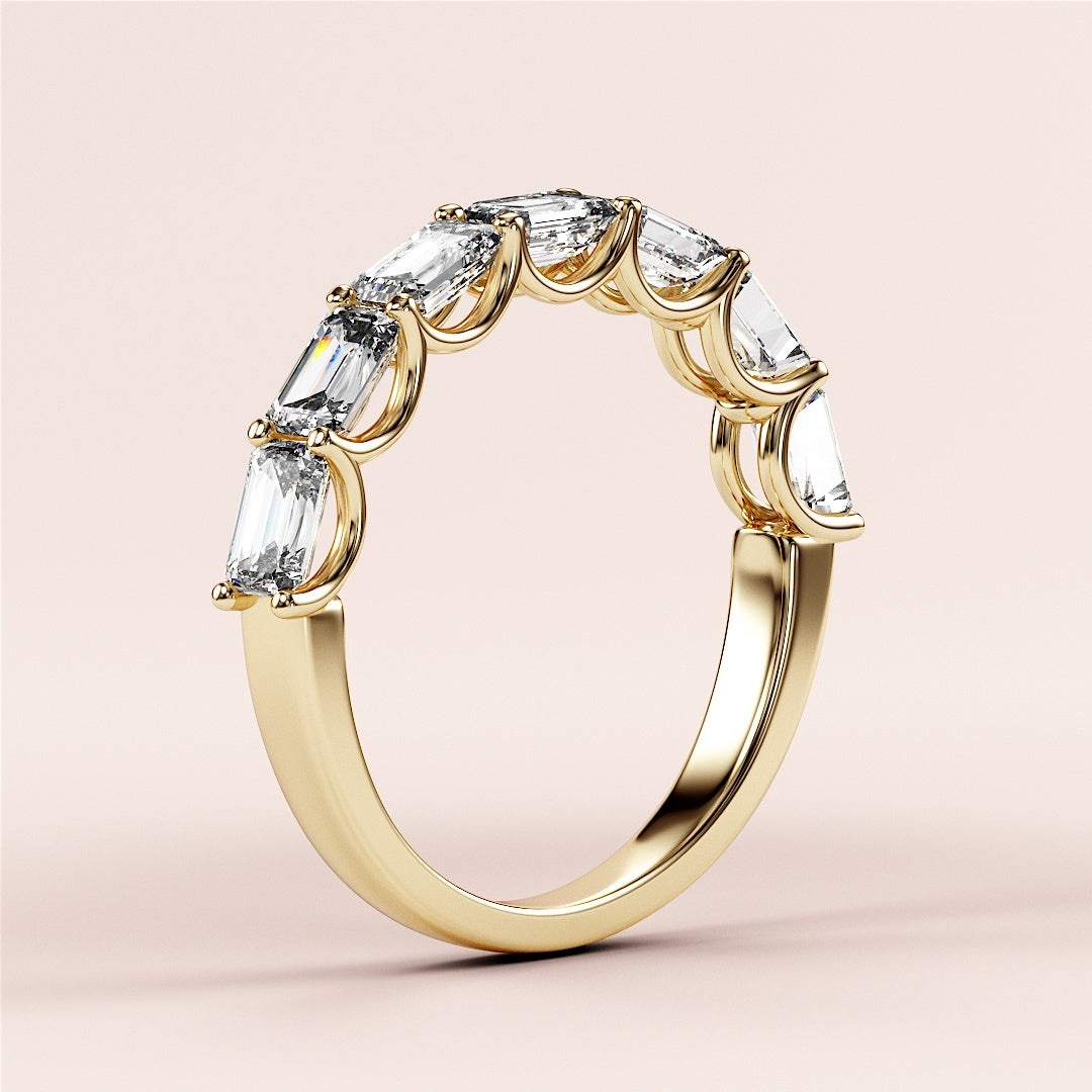 Elegant 14K/18K yellow gold emerald-cut diamond half eternity wedding band, showcasing sophistication and timeless style. |
 
 
 #14KRecycledYellowGold
 #18KRecycledYellowGold