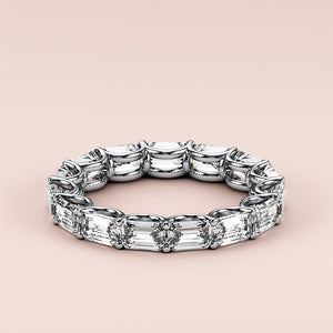 Elegant emerald-cut diamond eternity wedding band in 14K or 18K white gold or platinum, showcasing timeless luxury and intricate design. 