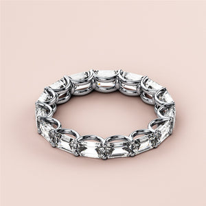 Luxurious 14K white gold emerald eternity wedding band featuring pear-shaped diamonds, not worn on a model. 