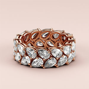 Exquisite 14K/18K Rose Gold pear-shaped diamond eternity wedding band, featuring sparkling diamonds for timeless elegance. 