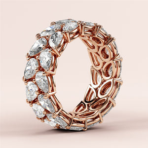 Luxurious 14K or 18K rose gold teardrop diamond eternity wedding band with two rows of expertly crafted diamonds. 