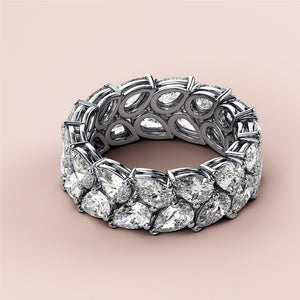 Elegant 14K or 18K gold or platinum eternity wedding band set with brilliant oval-shaped diamonds on a neutral background. 