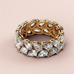 Elegant yellow gold eternity wedding band featuring pear-shaped diamonds in 14K or 18K gold or platinum for timeless sophistication. 