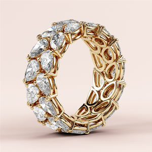 Elegant 14K or 18K gold wedding band featuring pear-shaped diamonds in a two-row eternity design, showcasing exquisite craftsmanship. 