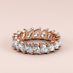 Elegant 14K Rose Gold marquise-cut diamond eternity wedding band displayed, perfect for everlasting love and timeless style. 