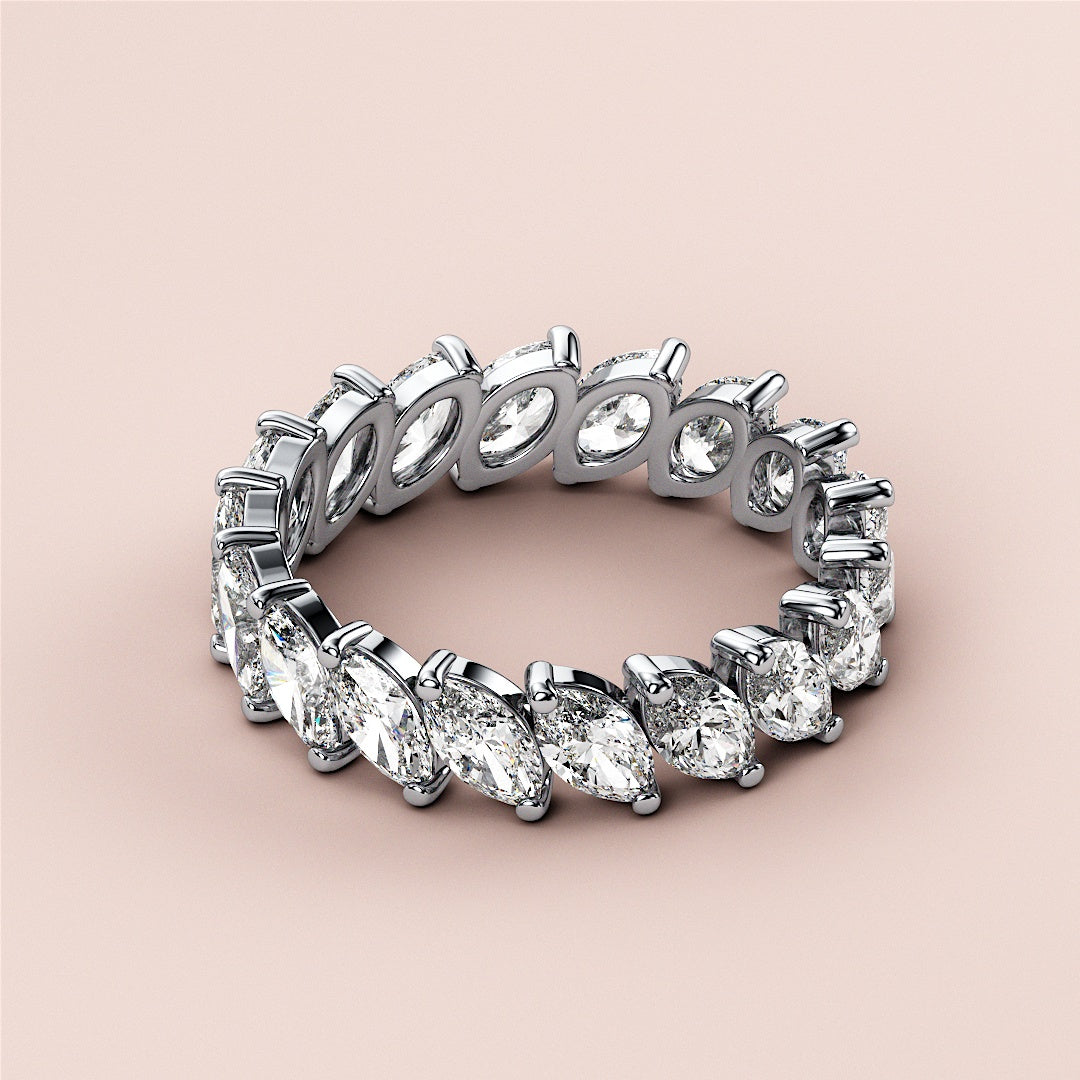 Elegant marquise eternity wedding band in 14K/18K white gold, featuring sparkling diamonds in a continuous design. |
 #14KRecycledWhiteGold
 #18KRecycledWhiteGold
 
 
 
 
 #Platinum