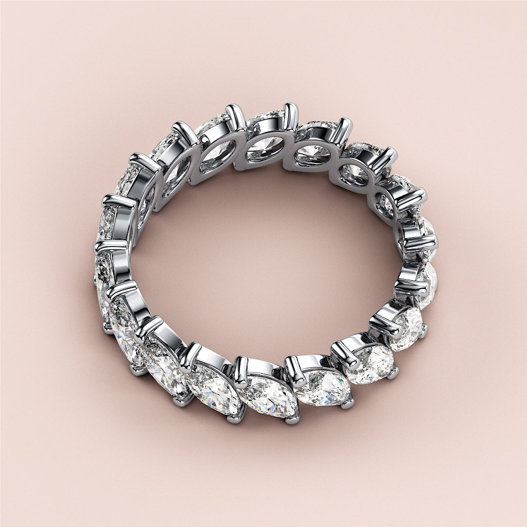 Marquise-cut diamond eternity band in 14K or 18K gold or platinum, featuring brilliant diamonds encircling the ring. |
 #14KRecycledWhiteGold
 #18KRecycledWhiteGold
 
 
 
 
 #Platinum
