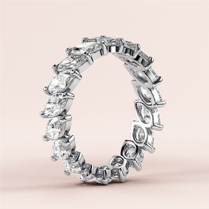 Elegant white gold marquise eternity wedding band featuring diamonds, available in 14K, 18K, or platinum. 