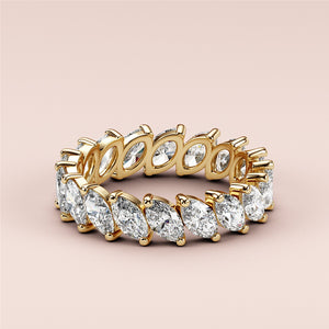 Elegant yellow gold marquise eternity wedding band featuring diamonds, available in 14K, 18K, and platinum options. 