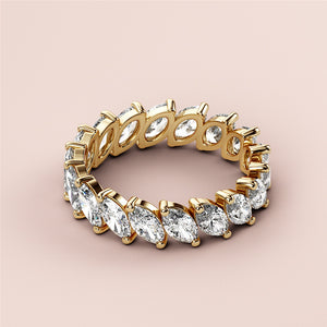 Elegant 14K yellow gold eternity wedding band featuring marquise-shaped diamonds, perfect for special occasions and timeless style. 