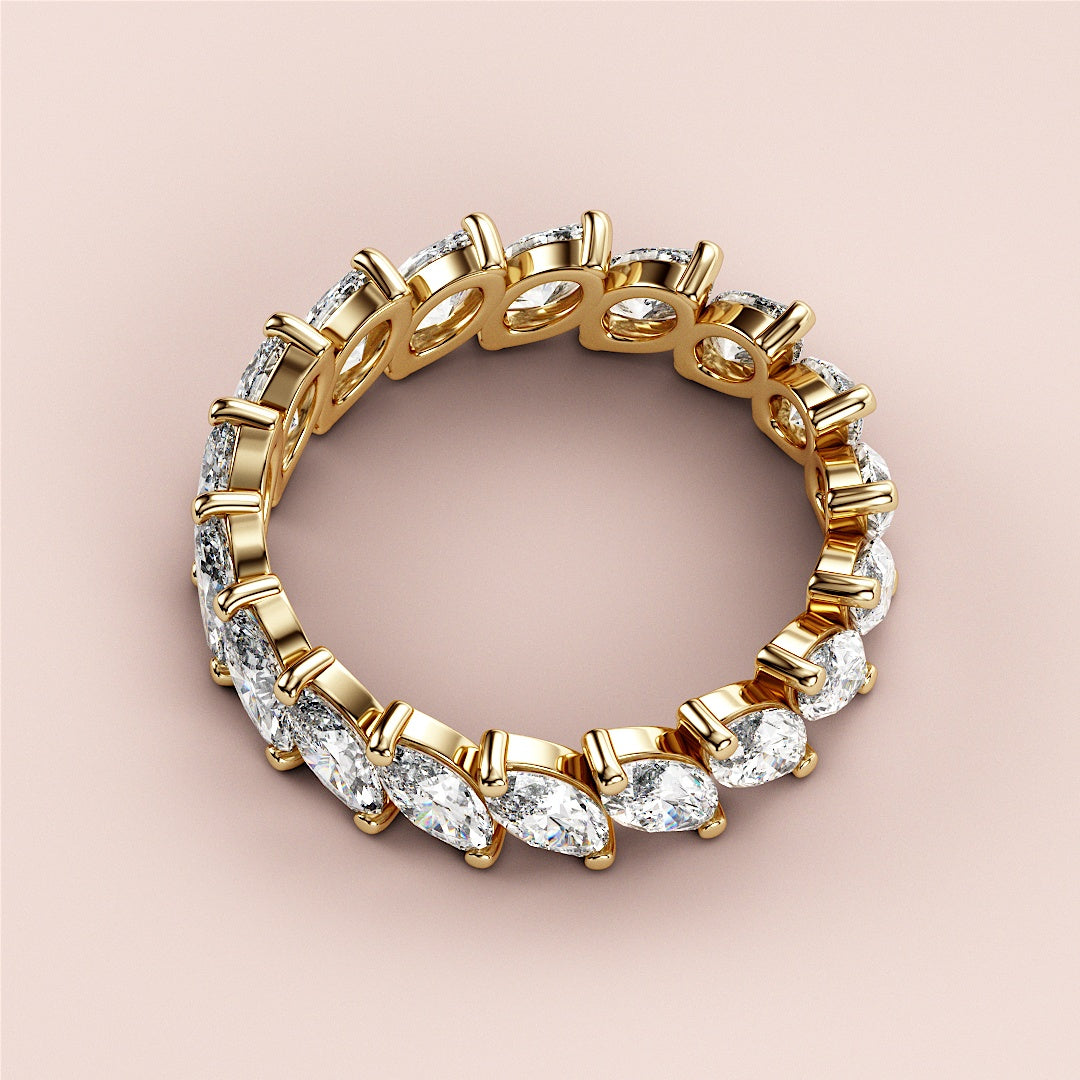 Elegant 14K or 18K yellow gold eternity wedding band with marquise-cut diamonds, perfect for timeless love. |
 
 
 #14KRecycledYellowGold
 #18KRecycledYellowGold