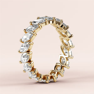 Golden marquise diamond eternity wedding band in 14K or 18K gold or platinum, showcasing timeless elegance and craftsmanship. 