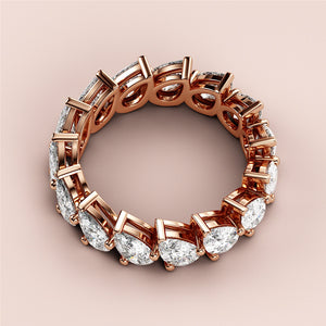 Elegant pear-shaped diamond eternity ring in 14K rose gold, a stunning wedding band showcasing a continuous loop of diamonds. 