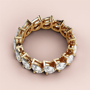 Elegant 14K or 18K gold wedding band featuring pear-shaped diamonds in a continuous eternity design, perfect for timeless elegance. 