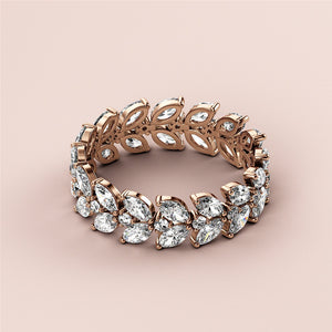Elegant rose gold wedding band featuring marquise-cut diamonds, available in 14K, 18K, and platinum variations. 